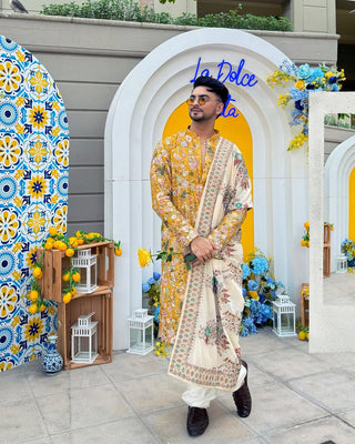 DHAARMIK SAMANI IN PHOOLPANKH HALDI KURTA SET